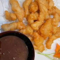 Honey Seared · Lightly battered and fried, tossed in honey garlic chili sauce.