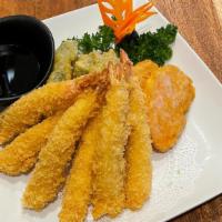 Tempura Dinner · 6 Traditional Japanese fried shrimp and assorted vegetables.