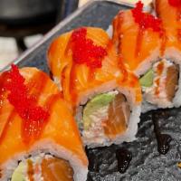 Red October Roll · Roll contains raw fish. Inside: snow crab, salmon, avocado. Top: salmon, red tobiko, eel sau...