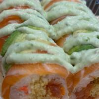 Emerald Roll (Soy Paper) · Roll contains raw fish. Inside: snow crab, spicy tuna, crunchy. Top: salmon, avocado, house-...