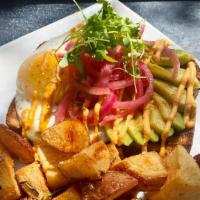 Avocado Toast · Avocado toast with pickled onions, sunny side up egg, cilantro micro greens, carrot chipotle...