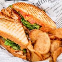 Chicken Bacon Panini · Fresh tomatoes, spinach , provolone cheese. Served with house made chips