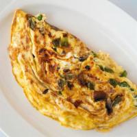 Omelettes · Green peppers tomatoes mushrooms and ham.