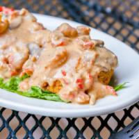 Who Dat Crab Cakes Plate · Topped with crawfish and mushroom cream sauce.
