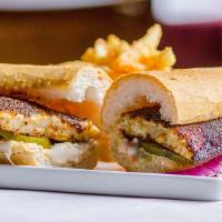 Blackened Catfish Po-Boy · Most popular. Remoulade and coleslaw. Served with french fries.