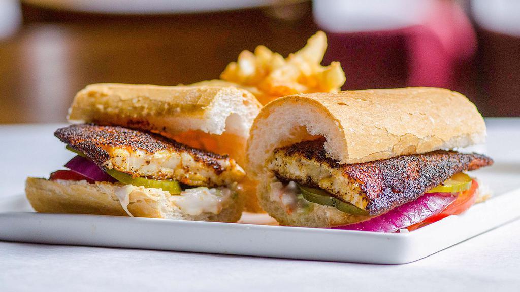 Blackened Catfish Po-Boy · Most popular. Remoulade and coleslaw. Served with french fries.