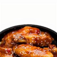 Wings · Classic bone-in wings oven-baked, cooked to order perfectly crisp, tossed with your choice o...