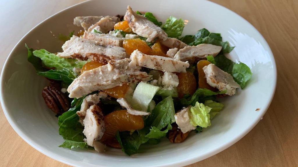 Raspberry Pecan Chicken Salad · Fresh green lettuce mix with grilled chicken, chopped pecans, mandarin oranges and crumbled feta cheese.
