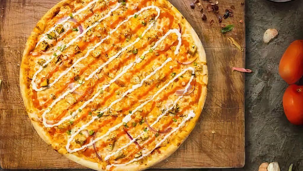 Bbq Chicken Pizza (14 Inch) (Large) · Starts with our own marmalade BBQ sauce, topped with garlic-roasted chicken, red onions, and premium mozzarella.