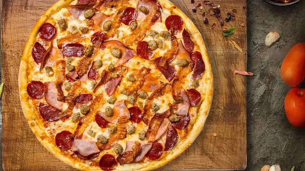 Meat Feast (14 Inch) (Large) · A magnificent meat medley with pepperoni, seasoned ground beef, ham, hand-cut Italian sausage and premium mozzarella.