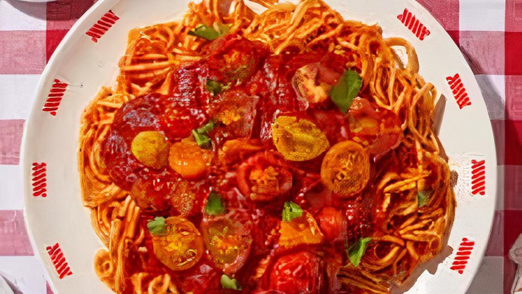 Spaghetti Classico · Classic Italian spaghetti with marinara sauce served with freshly baked breadsticks, with marinara sauce topped with mozzarella.