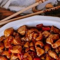 Diced Chicken With Cashew Nuts · Served with white rice.