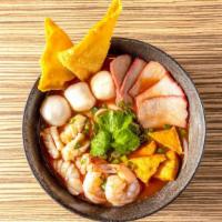Yen Ta Fo · Flat noodles with roasted pork, shrimp, fish balls, fried tofu, fried wonton, cilantro and s...