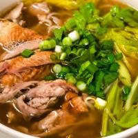 Roasted Duck Noodle Soup · Rice noodles with sliced roasted duck, celery, bean sprouts, cilantro and scallions in a hou...