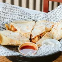   Quesadilla · 3 tenders, cheddar jack, tomato, pepperoncini, green onion and sour cream. served with spicy...