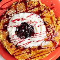Four Berry Pancakes · Our original buttermilk pancakes filled with strawberries, blueberries, blackberries, and re...