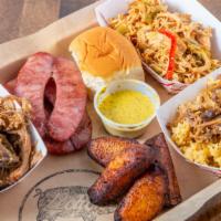 Tripleta Platter · Pulled chicken, pulled pork & argentine sausage, served with lechon rice & sweet plantains.