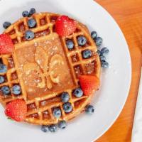 Homemade Waffle · Add chicken, sausage, ham, or bacon for an additional charge.