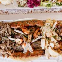 Family Tray · Chicken shish, Adana kebab, beef shawarma, gyro, lamb chops & chicken shawarma.
