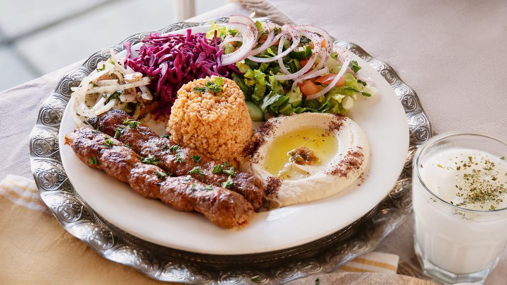 Adana Kabob · Fresh ground lamb blended w/ houses spices then charbroiled on skewers.