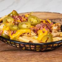 Loaded Fries · loaded fries include onions, bellp,bacon,nacho cheese, jalapeño peppers and grilled chicken.
