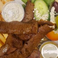 Yeero Platter · Your choice of  shaved Chicken or Taditional Lamb  served with a Greek salad, fries, grilled...