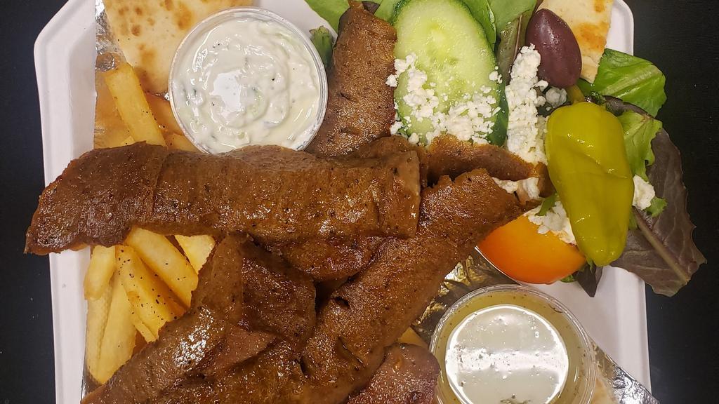 Yeero Platter · Your choice of  shaved Chicken or Taditional Lamb  served with a Greek salad, fries, grilled pita bread and tzatziki sauce.