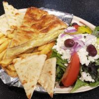 Cheese Pie Platter · Baked Cheese pie served with a Greek salad, fries, grilled pita bread and tzatziki sauce.