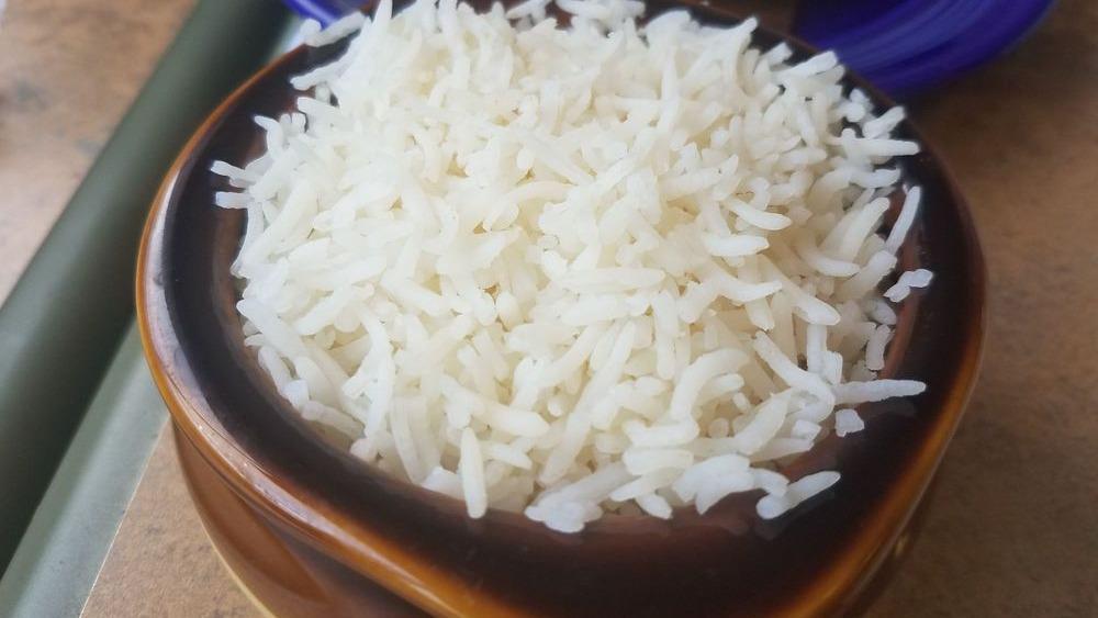 Plain Biryani Rice · Rice steamed with herbs and spices.