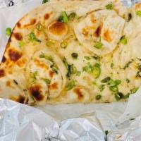 Chili Naan · Traditional naan with chili and butter.