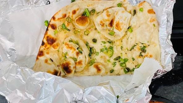 Chili Naan · Traditional naan with chili and butter.