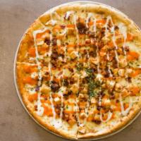 Buffalo Chicken · Crispy pizza crust topped with buffalo grilled chicken, bacon, white cheese sauce, and ranch...