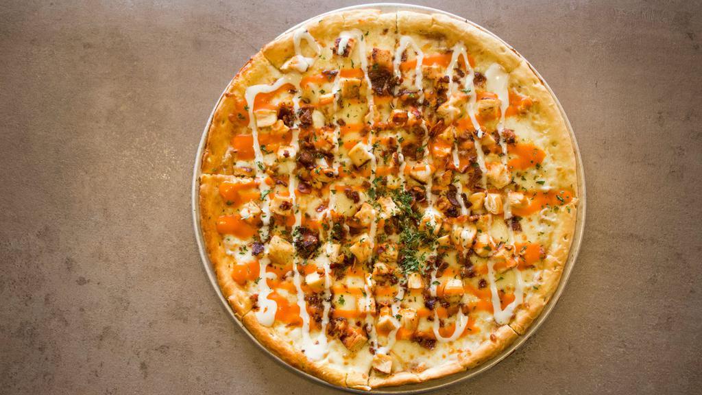 Buffalo Chicken · Crispy pizza crust topped with buffalo grilled chicken, bacon, white cheese sauce, and ranch dressing.
