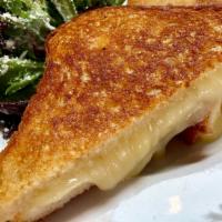 Rustic Grilled Cheese · Hook's 2 year cheddar grilled on wildflour sourdough bread.