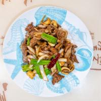Mongolian Beef · Sliced tenderloin beef stir fried with green onions and jumbo onions.