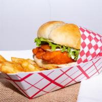 Buffalo Chicken Sandwich · Our hand-breaded chicken tenders, spun in Buffalo sauce and stacked on a fresh, sourdough bun.