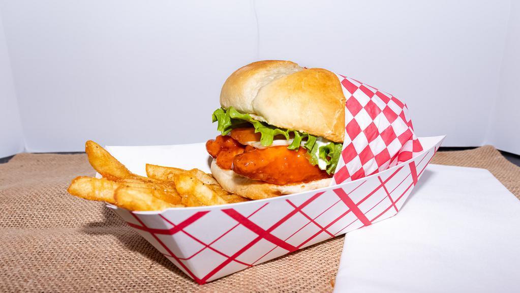 Buffalo Chicken Sandwich · Our hand-breaded chicken tenders, spun in Buffalo sauce and stacked on a fresh, sourdough bun.