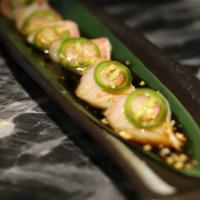 Yellow Tail Sashimi With Jalapeños · Six pcs yellowtail served with a garlic sweet ponzu sauce.