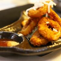 Calamari Ring Fry · Breaded crump calamari deep fry served with sweet chili sauce.