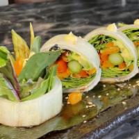 Cool Sushi Roll · Vegetarian. Cucumber warped around avocado, spring mix lettuce, asparagus, served with sweet...