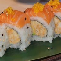 Pandora Roll · Spicy crunchy blue crab and avocado topped with salmon and yuzu torsiko.