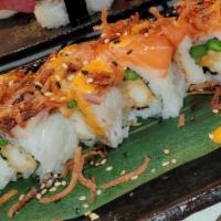Macon Roll · Shrimp tempura, asparagus, topped with salmon, tuna, yellow tail, crispy crabstick, spicy ma...