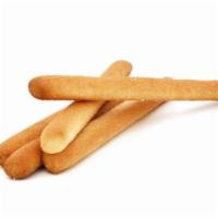Breadsticks · Buttery, crisp breadsticks baked to perfection.