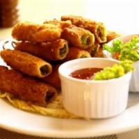 Cheese Sticks · Five golden brown cheese sticks filled with mozzarella cheese.
