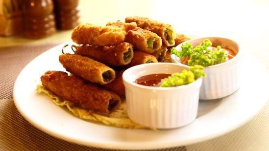 Cheese Sticks · Five golden brown cheese sticks filled with mozzarella cheese.