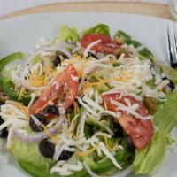 Garden Salad · Fresh lettuce, tomatoes, onion, green peppers, black and green olives, and mozzarella cheese...