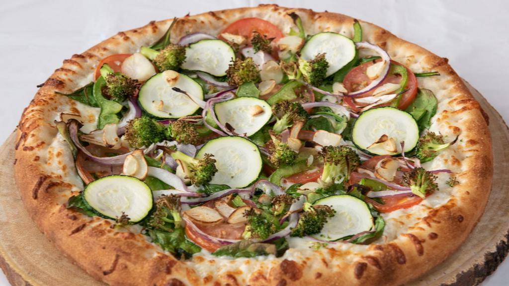 California Pizza · Olives oil, fresh spinach, onion, tomato, green peppers, fresh garlic, broccoli, and zucchini.