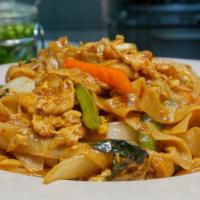 Drunken Noodle · Combination of green beans, tomatoes, basil, egg, onions, chili sauce, red and green bell pe...