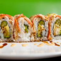Midnight Roll · I/O shrimp tempura, avocado, asparagus topped with crab stick and spicy mayo.