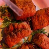 Salmon Bites · five bite-sized fresh salmon, fried in our Sports ONE signature breading, topped with mango ...